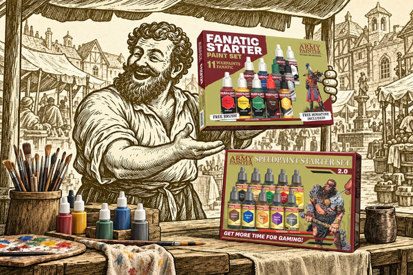 The Happy Chapman at a market stall holding up the Warpaints Fanatic Starter Paint Set beside the Speedpaint Starter Set 2.0